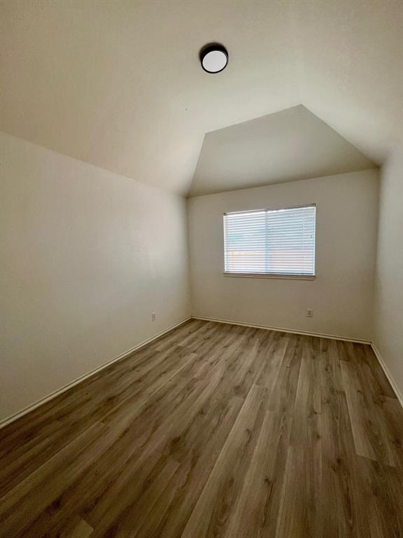 1348 Riley Drive Carrollton, TX 75007 - Photo 10 of 11 a view of an empty room and window