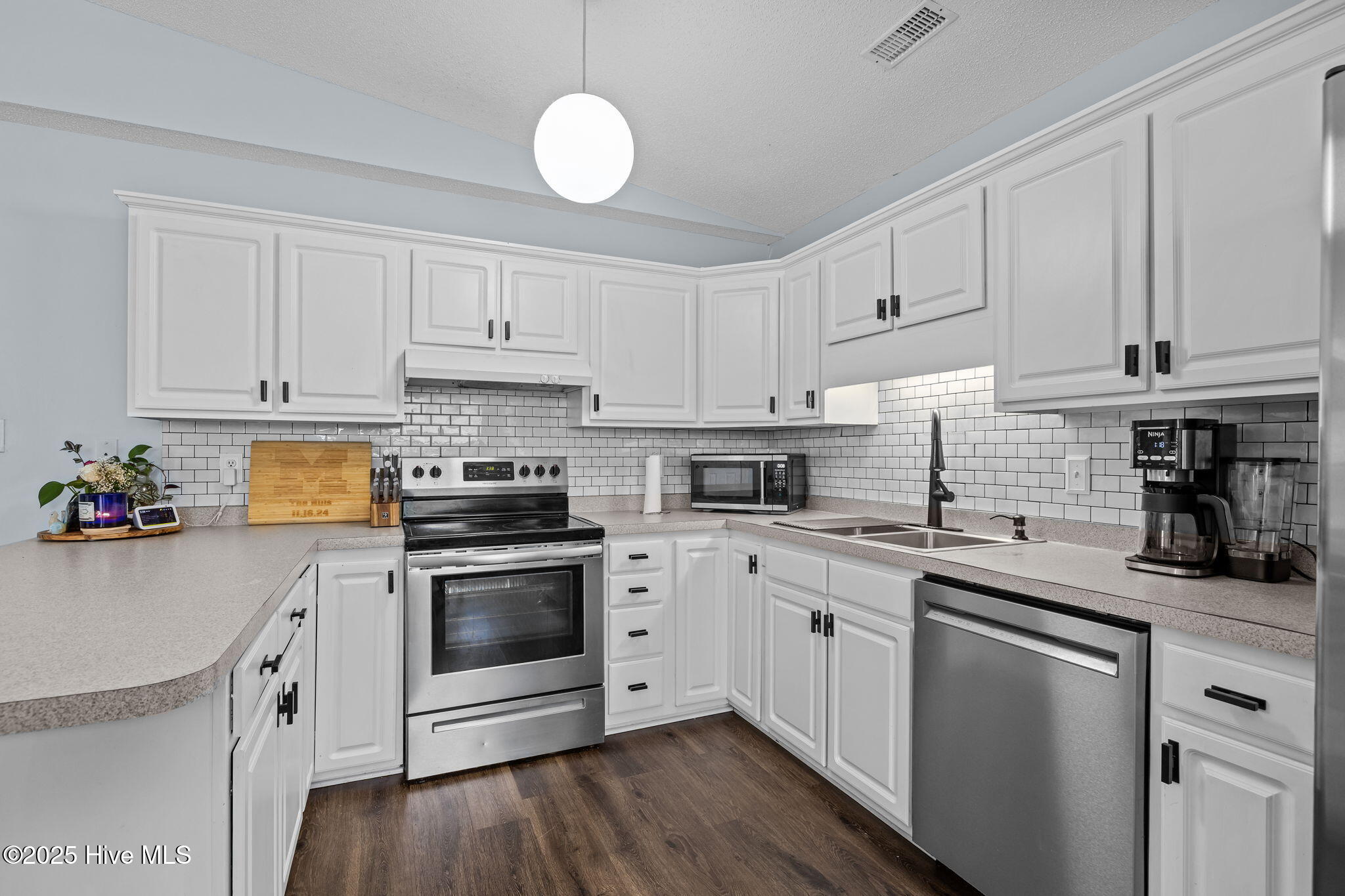 303 Osprey Ridge Drive Emerald Isle, NC 28594 - Photo 23 of 50 N Side Kitchen