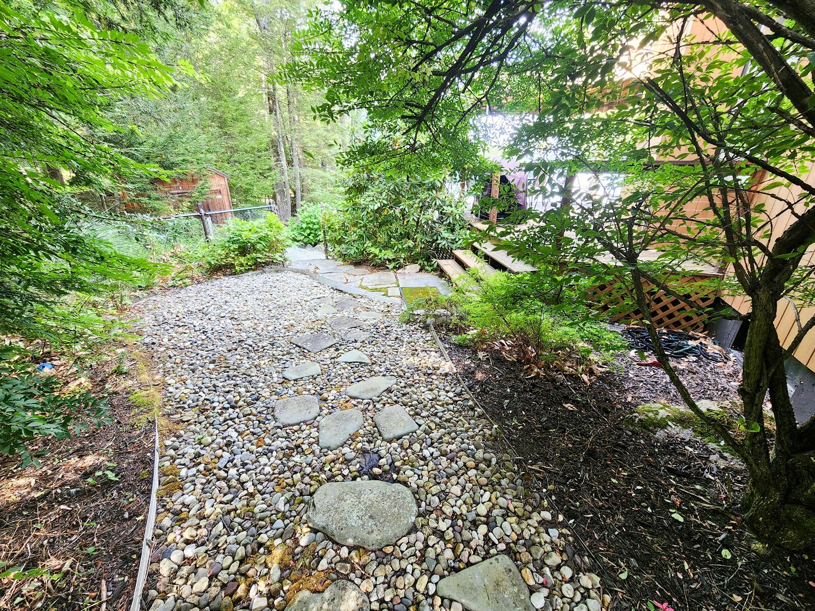 109 Wild Acres Road Raymond, ME 04071 - Photo 8 of 35 Walkway around house