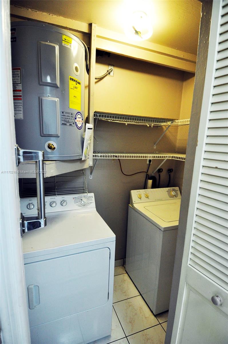 7420 Southwest 6th Street Miami, FL 33144 - Photo 15 of 21 a utility room with dryer and washer