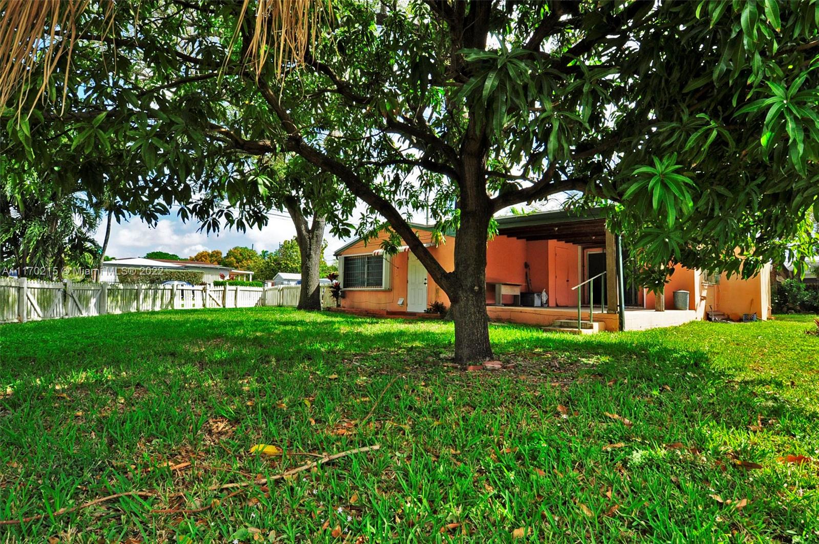 7420 Southwest 6th Street Miami, FL 33144 - Photo 5 of 21 a view of a garden with a tree