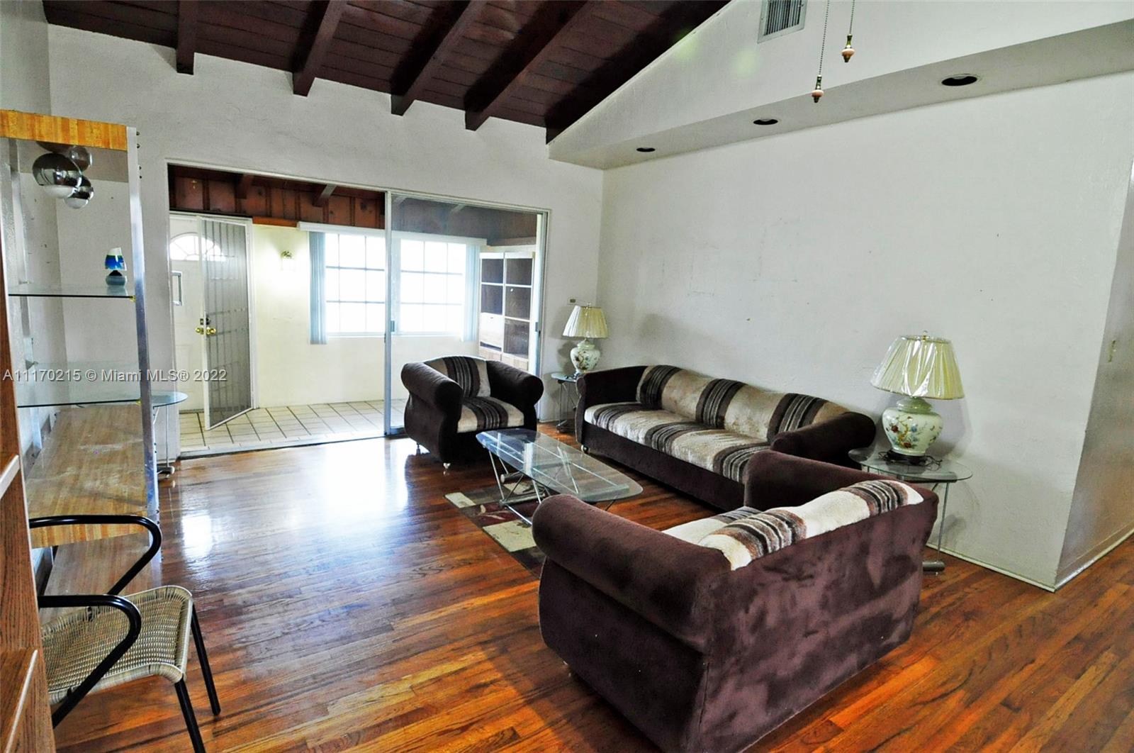 7420 Southwest 6th Street Miami, FL 33144 - Photo 9 of 21 a living room with furniture and a wooden floor