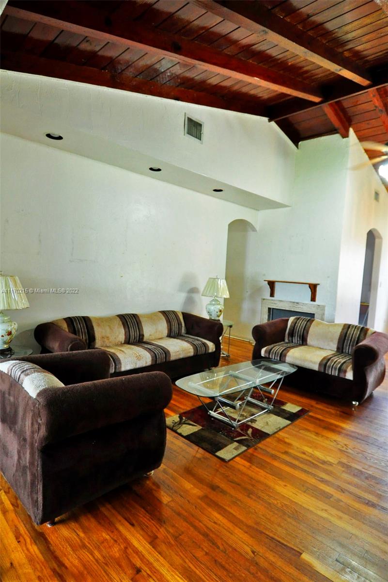 7420 Southwest 6th Street Miami, FL 33144 - Photo 10 of 21 a living room with furniture