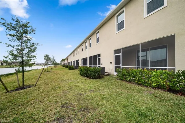 a view of a house with a big yard