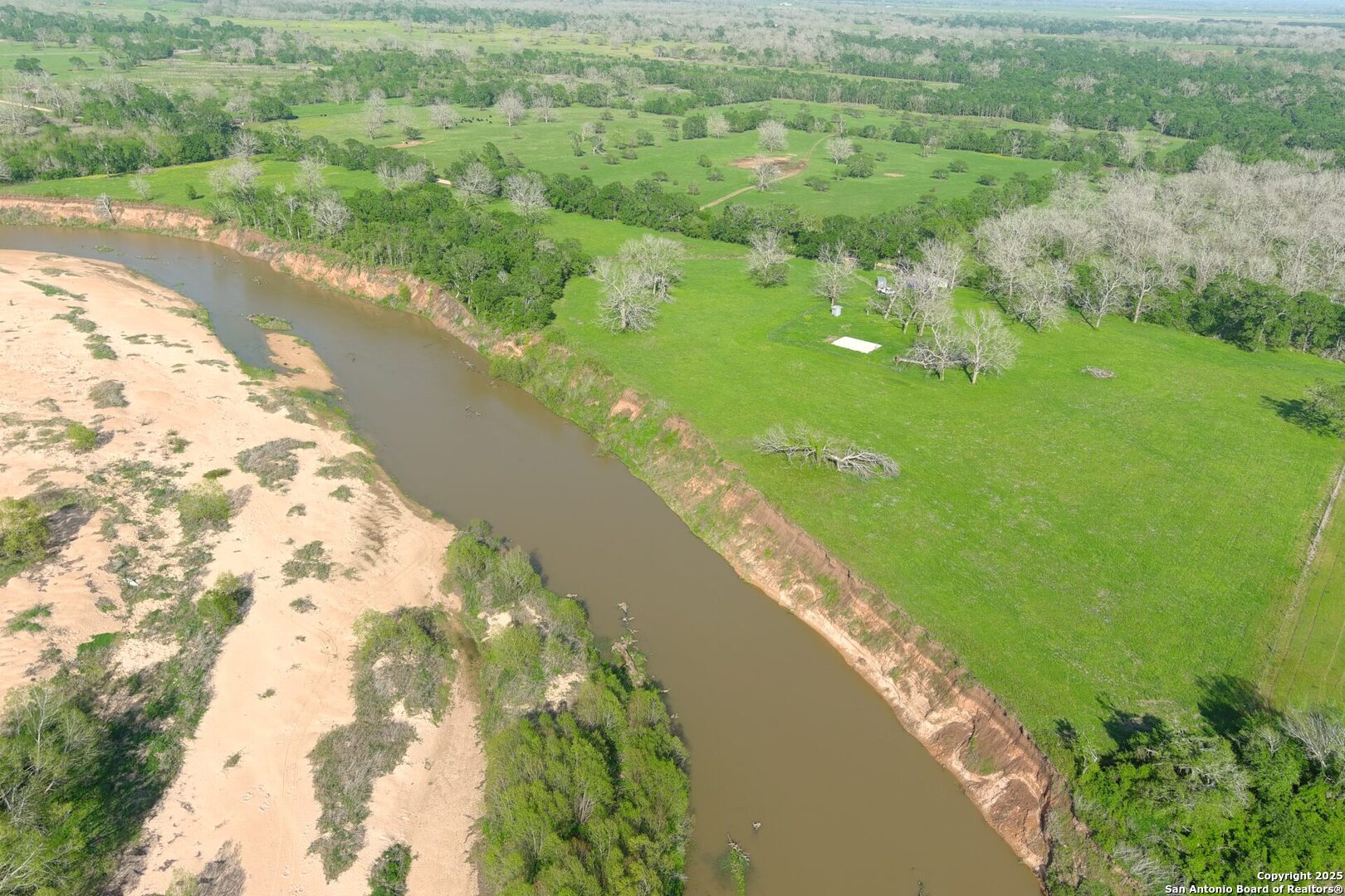 3780 County Road 257 Eagle Lake, TX 77434 - Photo 13 of 35 a view of a lake with a yard