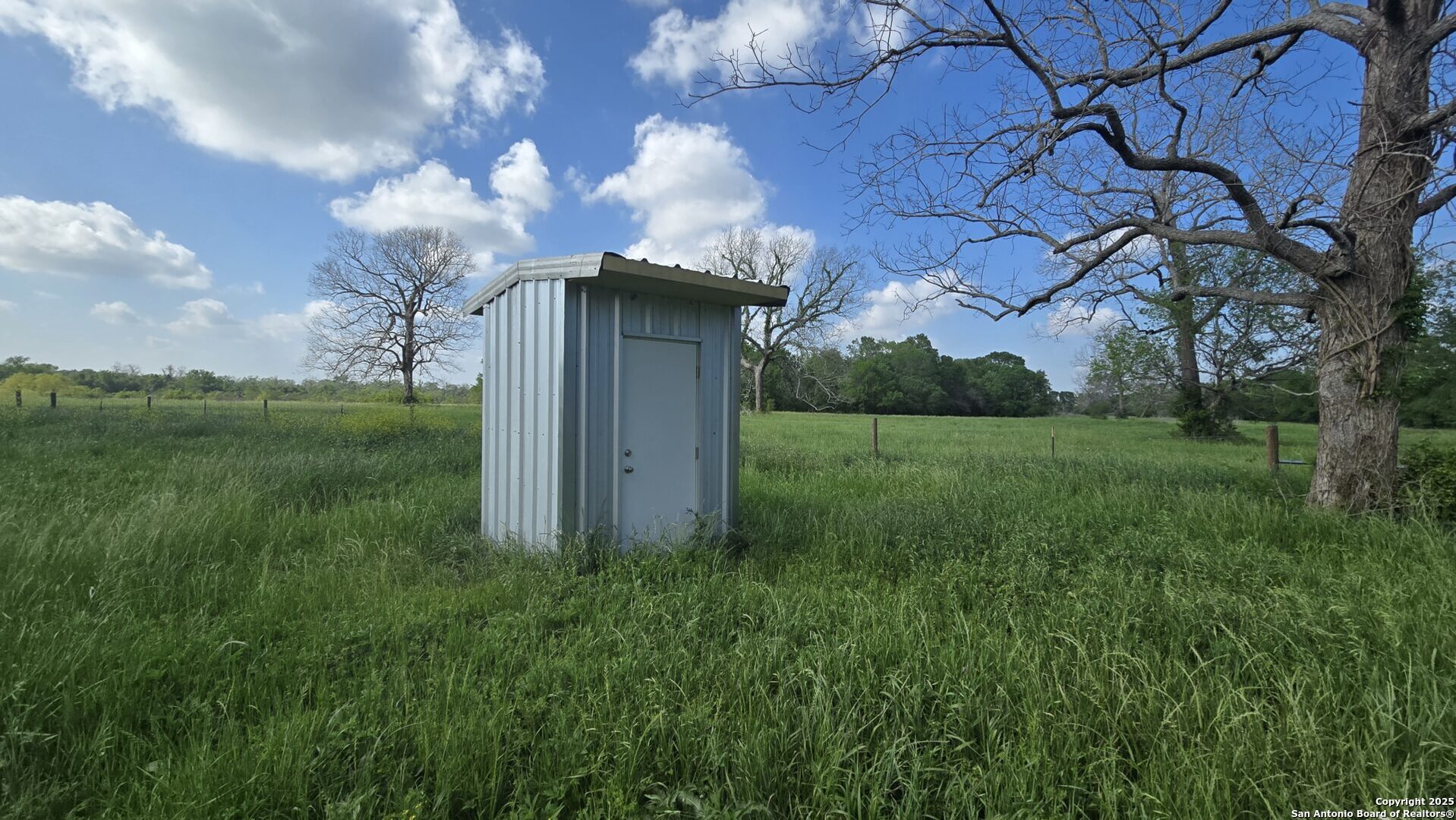 3780 County Road 257 Eagle Lake, TX 77434 - Photo 33 of 35 a view of a house with a yard
