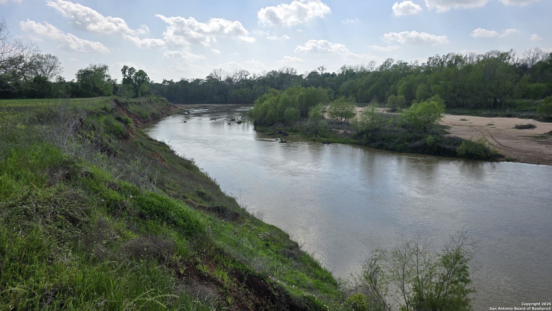 3780 County Road 257 Eagle Lake, TX 77434 - Photo 5 of 35 an aerial view of residential houses with outdoor space and lake view