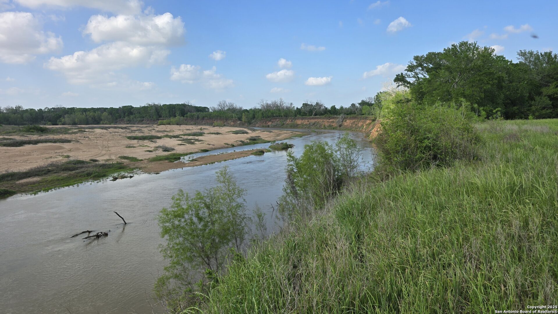3780 County Road 257 Eagle Lake, TX 77434 - Photo 7 of 35 a view of a lake with houses in the background