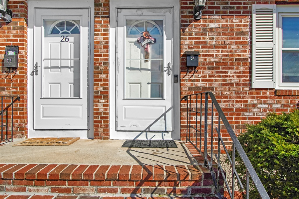 26 Moreland Avenue, Unit 28 Dedham, MA 02026 - Photo 2 of 18 a front view of a house