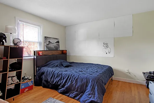 a bedroom with a bed and closet