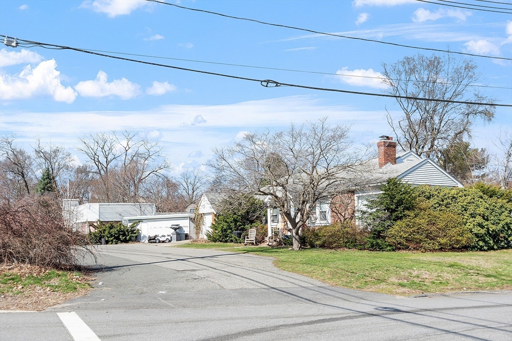 344 Broadway Lynnfield, MA 01940 - Photo 1 of 23 a view of a house with a yard