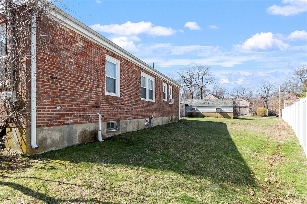 344 Broadway Lynnfield, MA 01940 - Photo 11 of 23 a view of a house with a yard