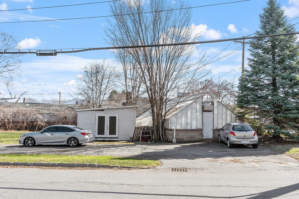 344 Broadway Lynnfield, MA 01940 - Photo 8 of 23 a view of a car parked on the side of a street