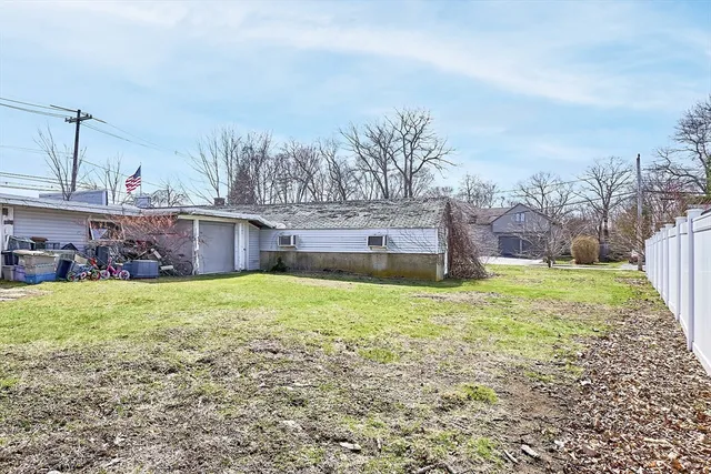 a fire hydrant in the middle of a field