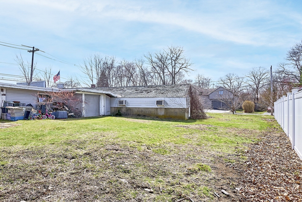 344 Broadway Lynnfield, MA 01940 - Photo 9 of 23 a fire hydrant in the middle of a field