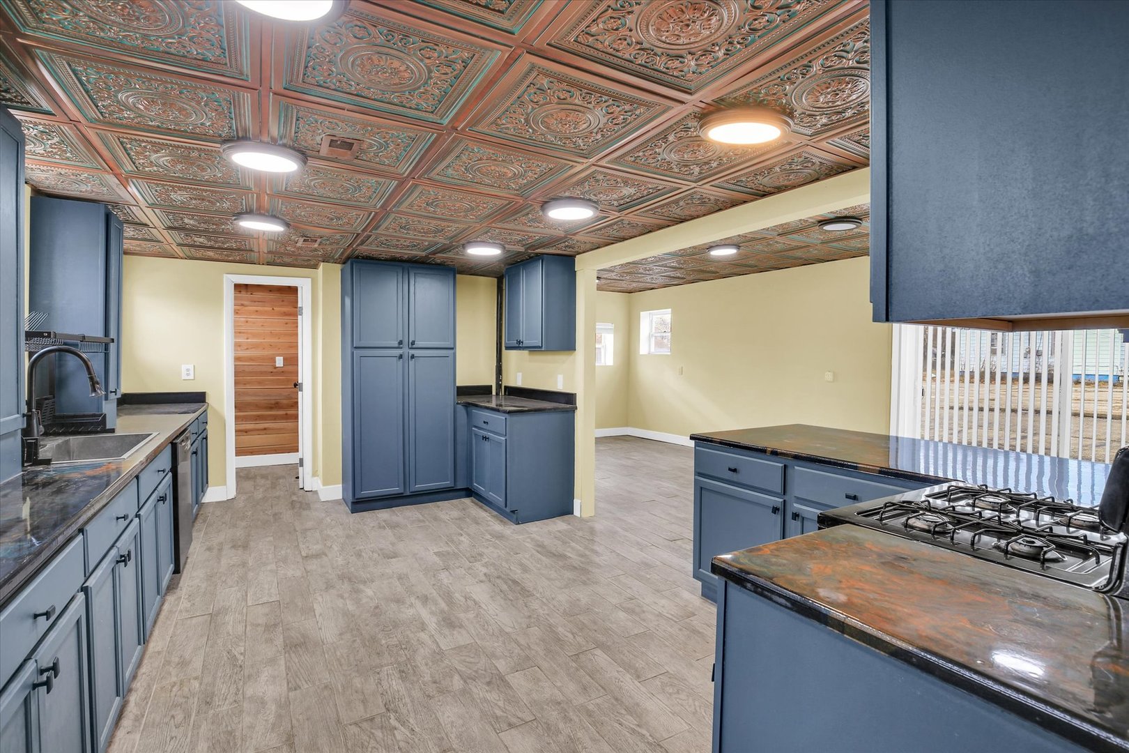 508 East Champaign Avenue Rantoul, IL 61866 - Photo 13 of 48 a kitchen with stainless steel appliances granite countertop a stove a sink and a refrigerator