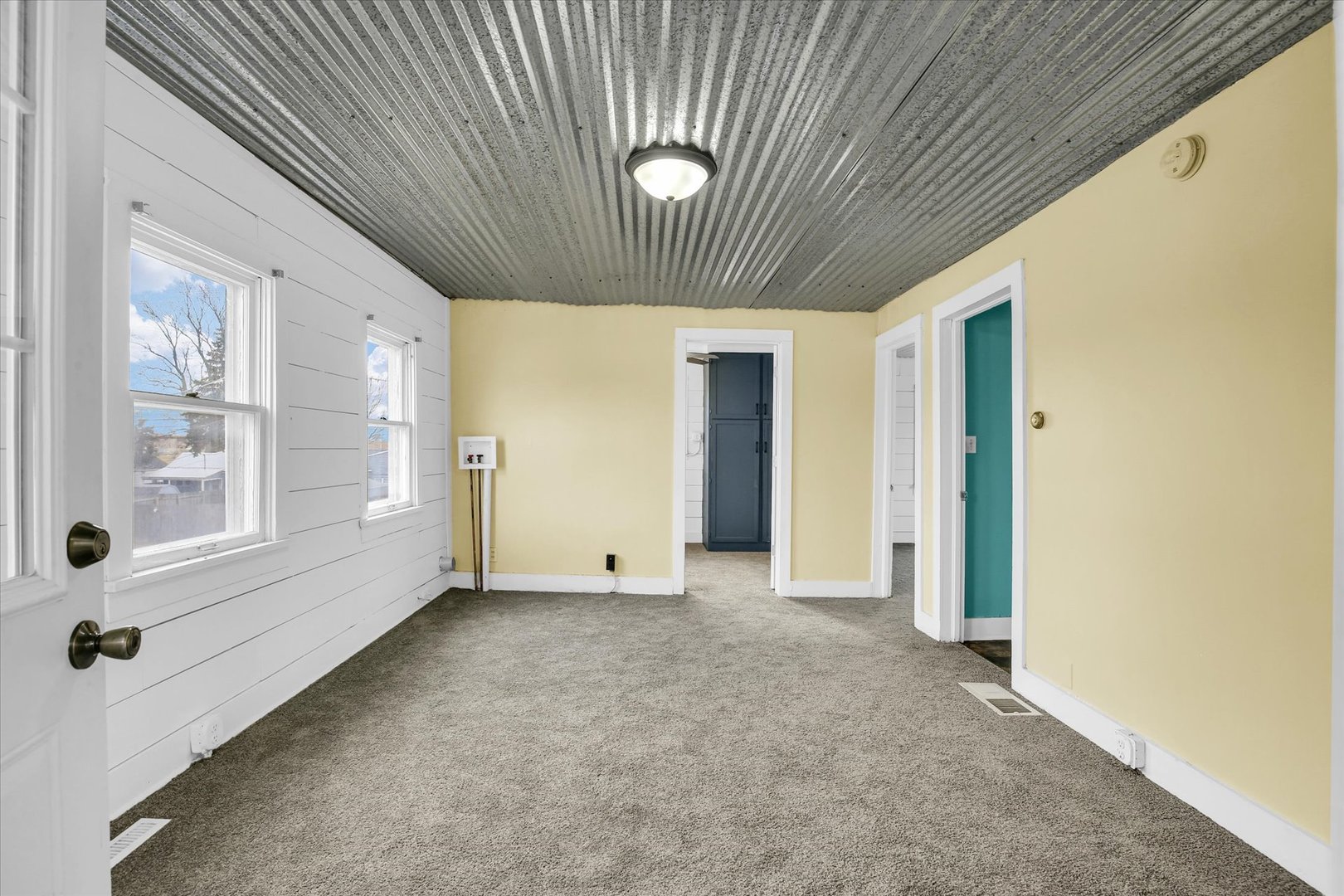 508 East Champaign Avenue Rantoul, IL 61866 - Photo 19 of 48 a view of an empty room with a window