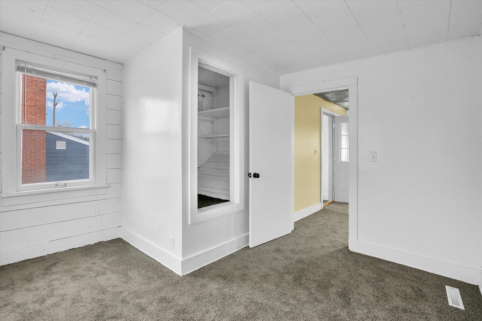 508 East Champaign Avenue Rantoul, IL 61866 - Photo 23 of 48 a view of an empty room with window