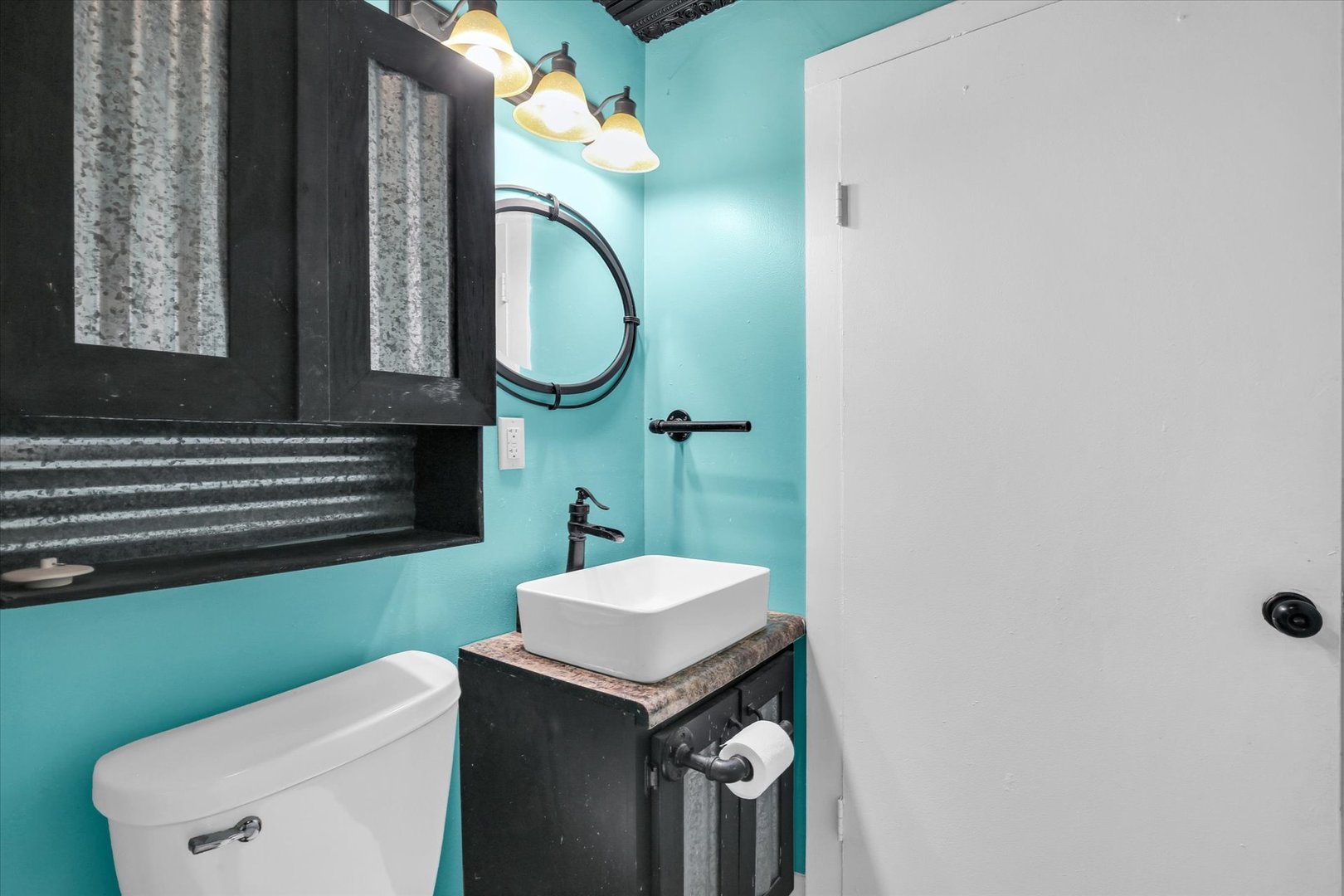 508 East Champaign Avenue Rantoul, IL 61866 - Photo 29 of 48 a bathroom with a sink mirror vanity and toilet