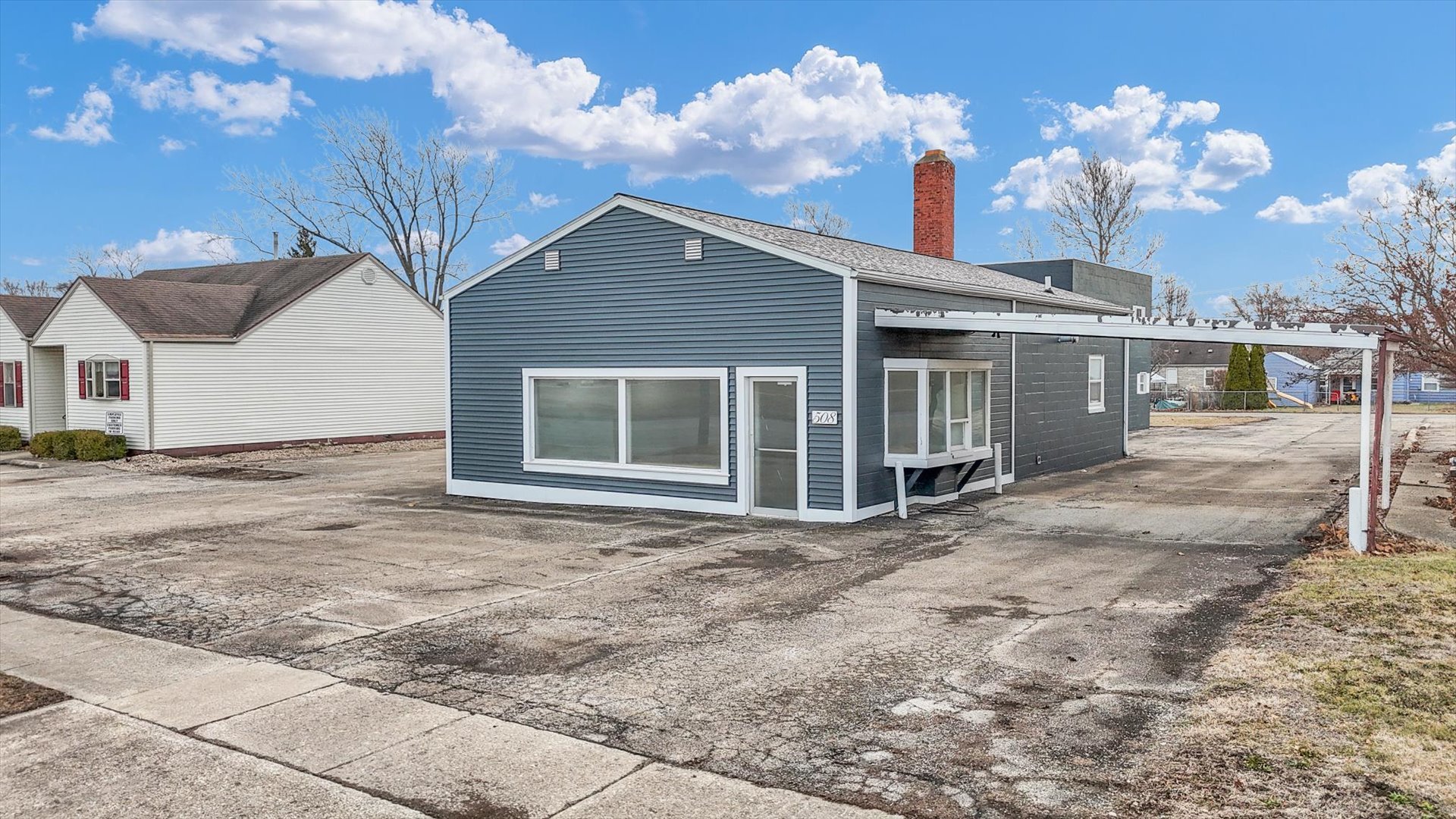 508 East Champaign Avenue Rantoul, IL 61866 - Photo 31 of 48 a front view of a house with a yard and garage