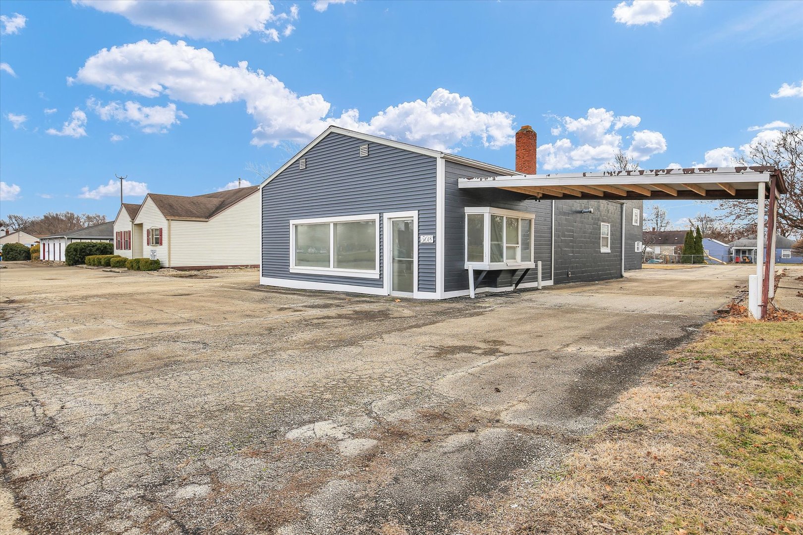 508 East Champaign Avenue Rantoul, IL 61866 - Photo 32 of 48 a view of a house with a patio