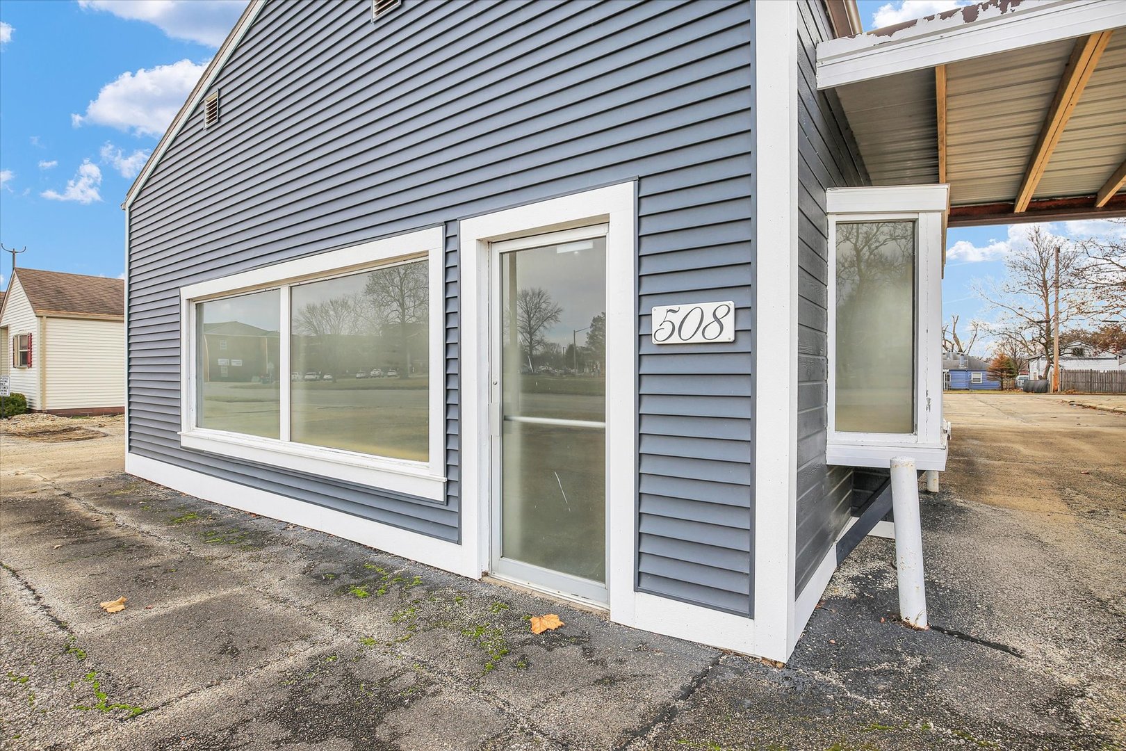 508 East Champaign Avenue Rantoul, IL 61866 - Photo 33 of 48 a view of a house with a door and wooden floor