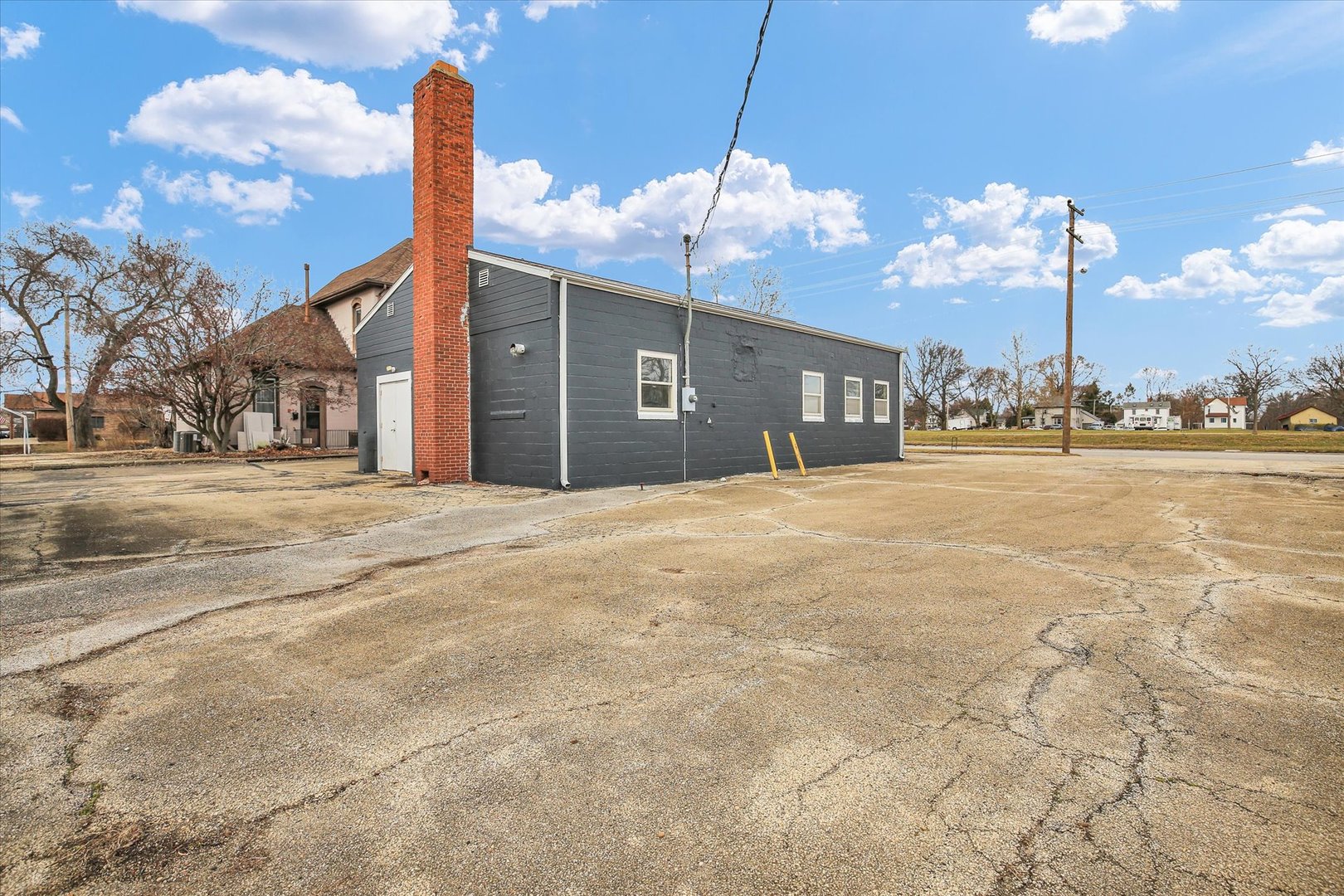 508 East Champaign Avenue Rantoul, IL 61866 - Photo 40 of 48 a view of a house with a yard