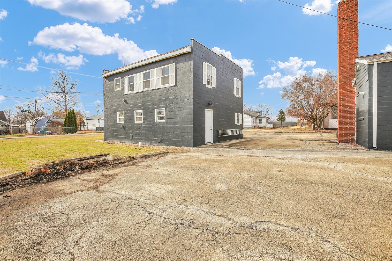 508 East Champaign Avenue Rantoul, IL 61866 - Photo 6 of 48 a view of a house with a yard