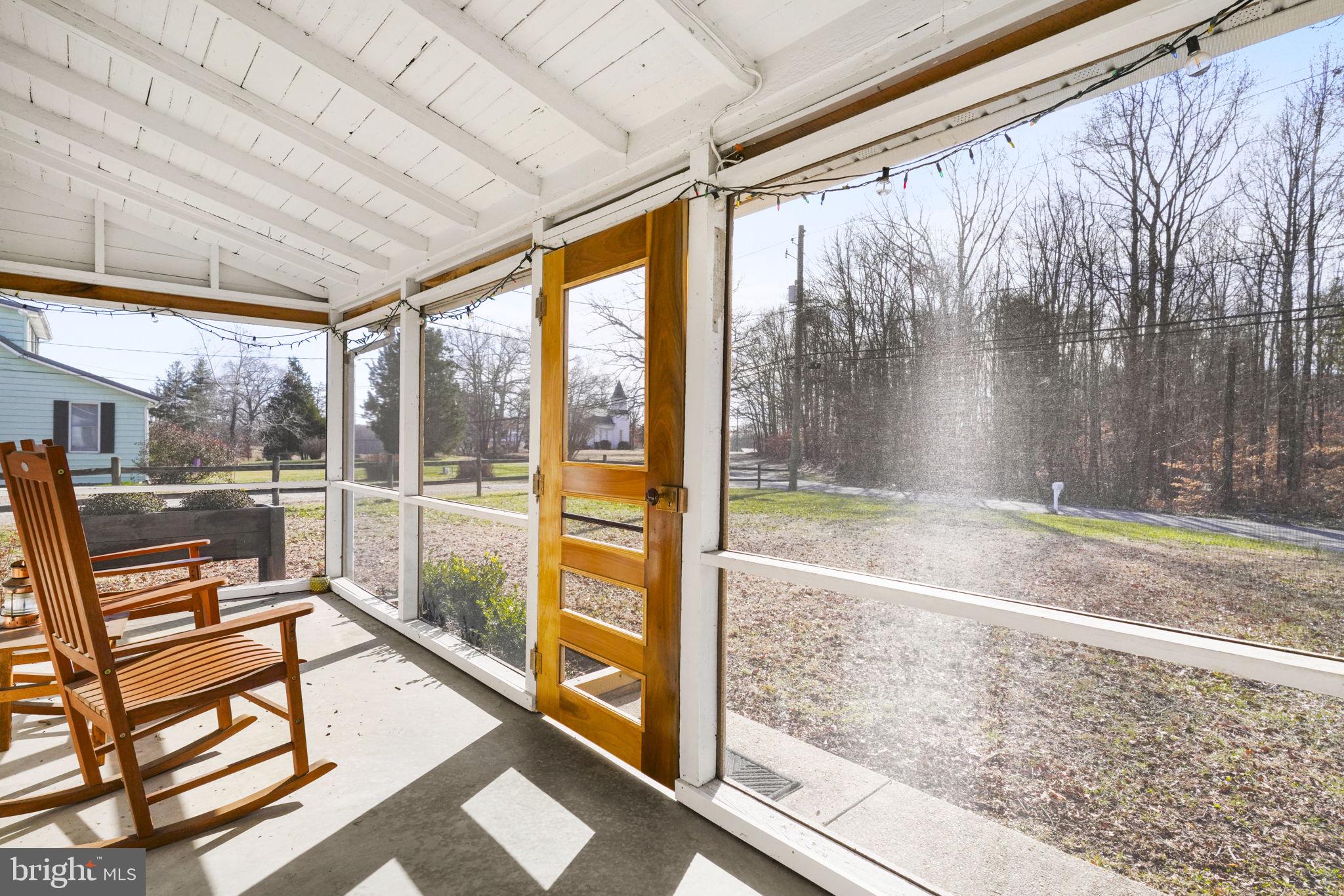 5369 Ed Prout Road Lothian, MD 20711 - Photo 22 of 35 Front screen porch