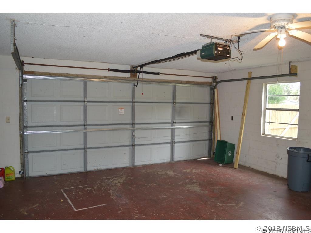 1867 Pine Tree Drive Edgewater, FL 32141 - Photo 6 of 10 a view of an empty room with a window