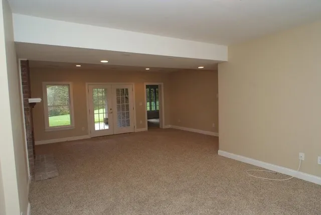 an empty room with windows