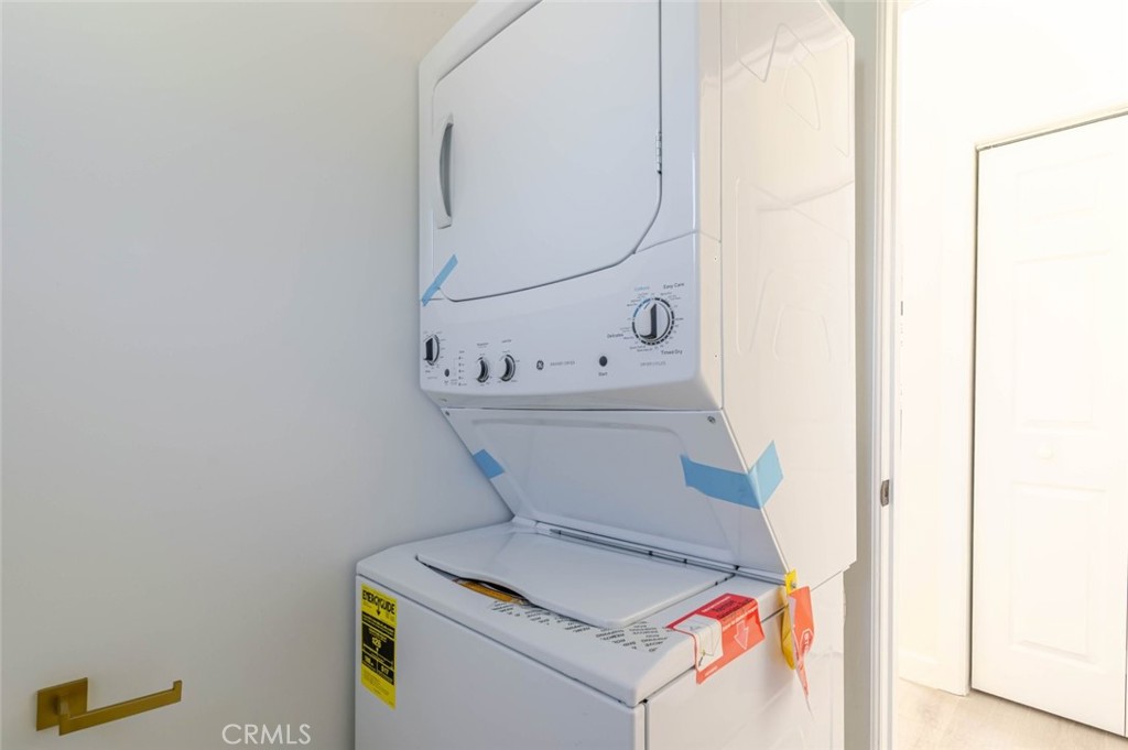 17426 Roscoe Boulevard Northridge, CA 91325 - Photo 15 of 28 a utility room with dryer and washer