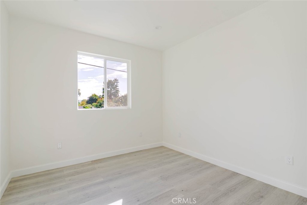 17426 Roscoe Boulevard Northridge, CA 91325 - Photo 20 of 28 an empty room with a window