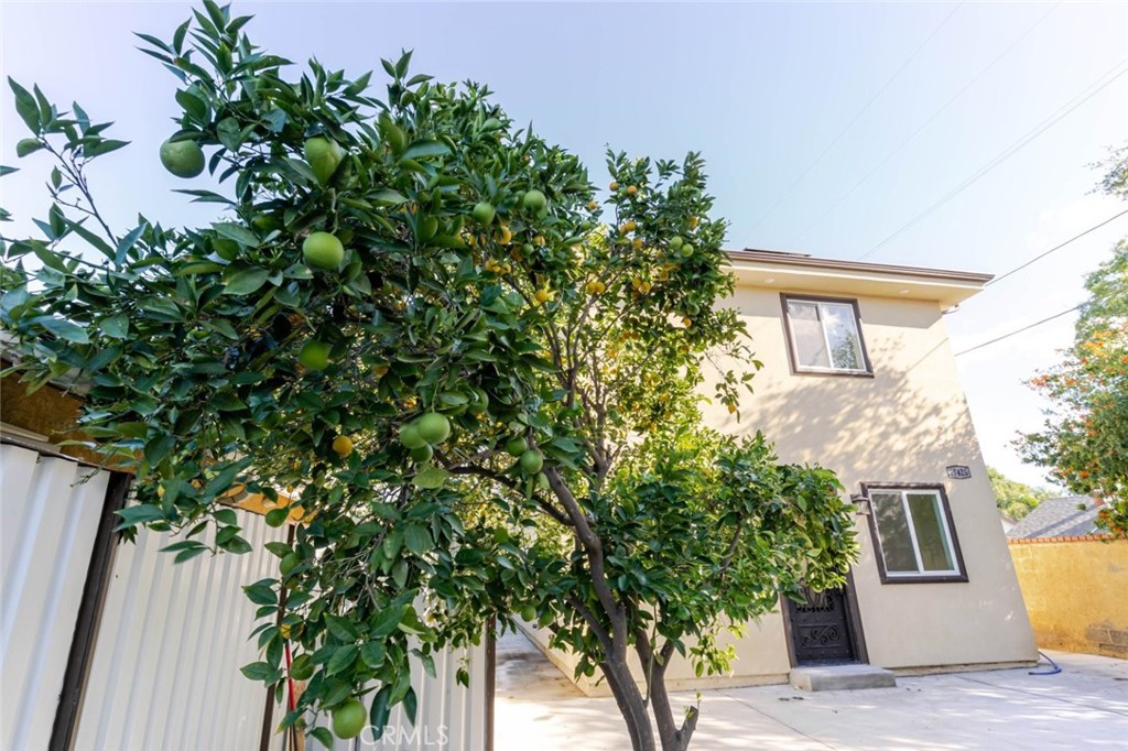 17426 Roscoe Boulevard Northridge, CA 91325 - Photo 28 of 28 view of a house with a tree