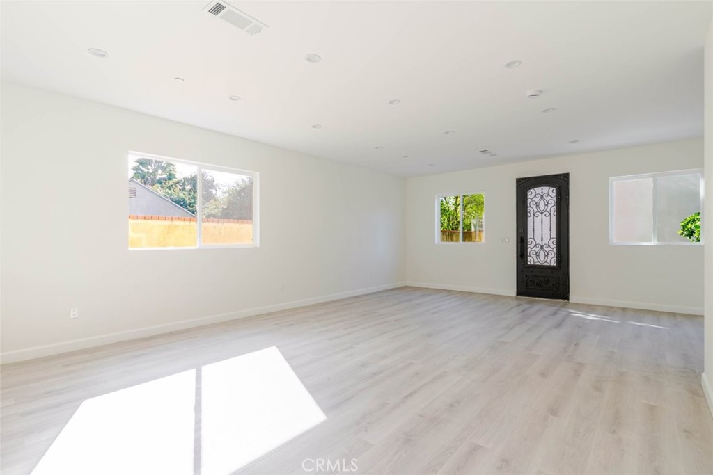 17426 Roscoe Boulevard Northridge, CA 91325 - Photo 9 of 28 a view of an empty room with a window