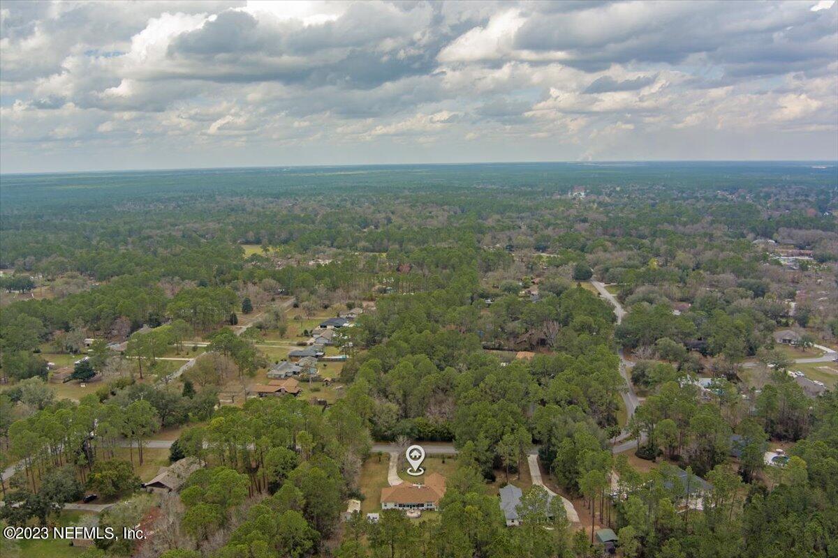 1233 Cactus Cut Road Middleburg, FL 32068 - Photo 12 of 46 an aerial view of residential houses with outdoor space and trees