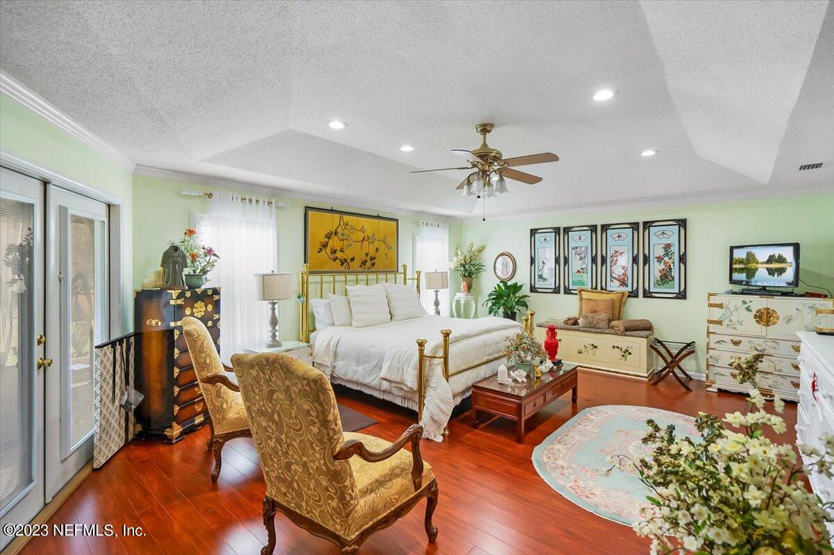 1233 Cactus Cut Road Middleburg, FL 32068 - Photo 15 of 46 a living room with furniture and a wooden floor