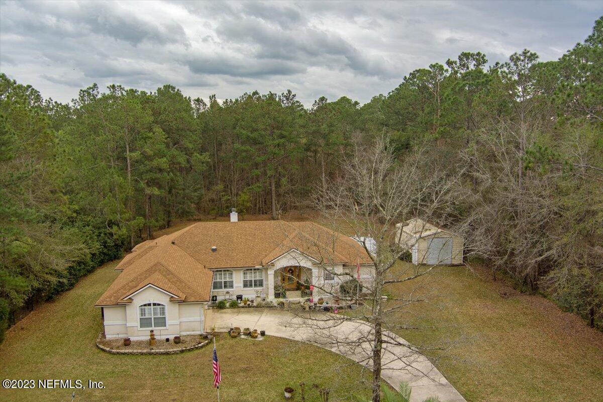 1233 Cactus Cut Road Middleburg, FL 32068 - Photo 3 of 46 a view of a house with a yard