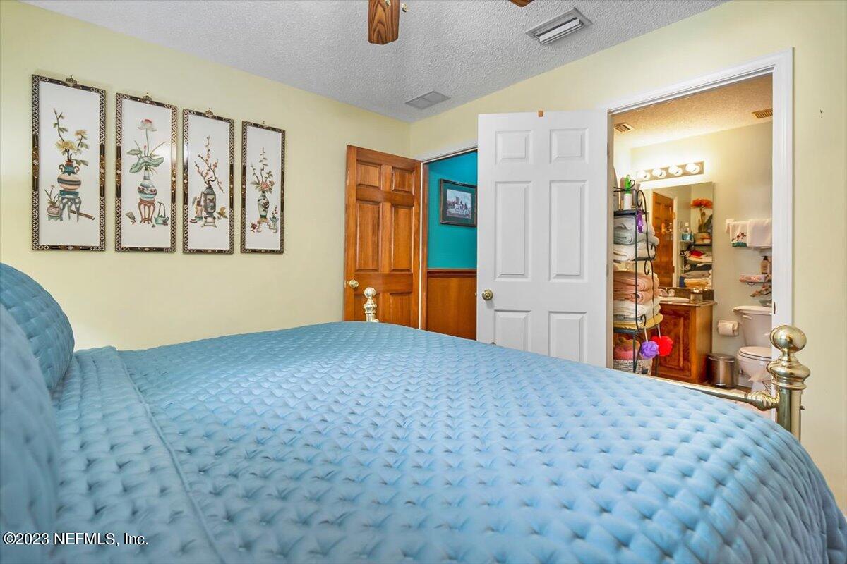 1233 Cactus Cut Road Middleburg, FL 32068 - Photo 40 of 46 a bedroom with a bed and a window