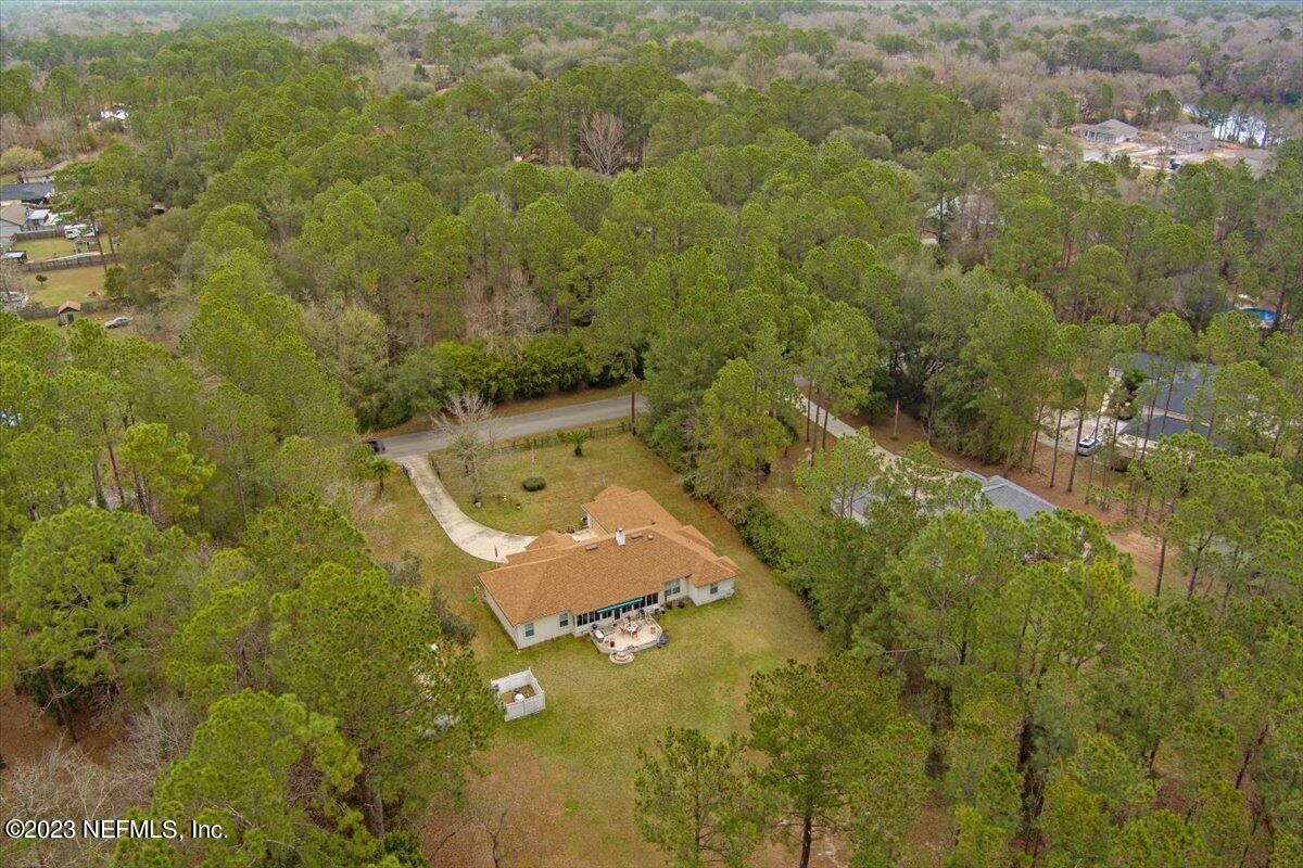 1233 Cactus Cut Road Middleburg, FL 32068 - Photo 6 of 46 view of a bathroom with a yard and mountain view