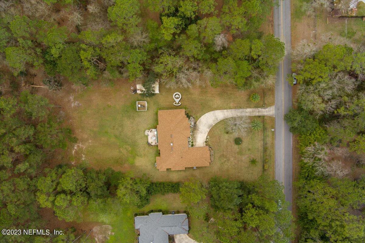 1233 Cactus Cut Road Middleburg, FL 32068 - Photo 9 of 46 an aerial view of a residential house with outdoor space