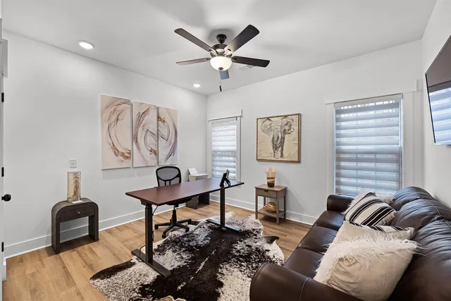 a living room with furniture and a window
