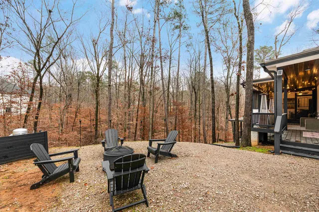 a view of a patio with couple of chairs