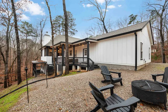 a view of a garage with a bike and car