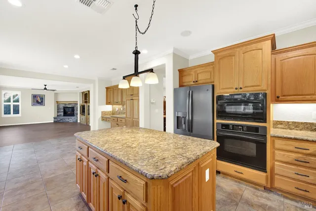 a view of a workspace with furniture and a air conditioner