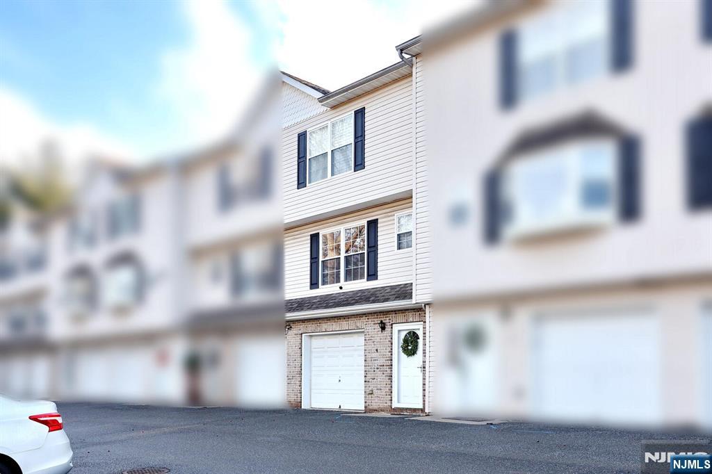 209 Union Street, Unit 4 Lodi, NJ 07644 - Photo 2 of 41 a front view of a house