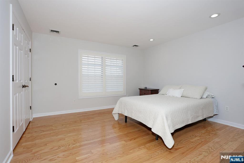 209 Union Street, Unit 4 Lodi, NJ 07644 - Photo 25 of 41 a bedroom with a bed and a window