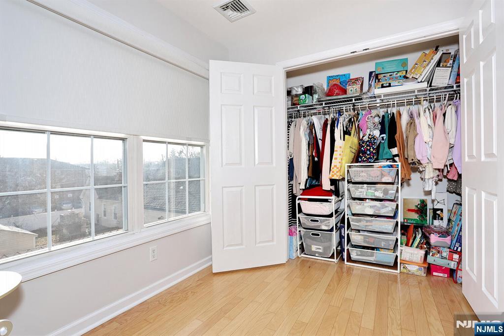 209 Union Street, Unit 4 Lodi, NJ 07644 - Photo 39 of 41 a view of a livingroom with furniture and toys