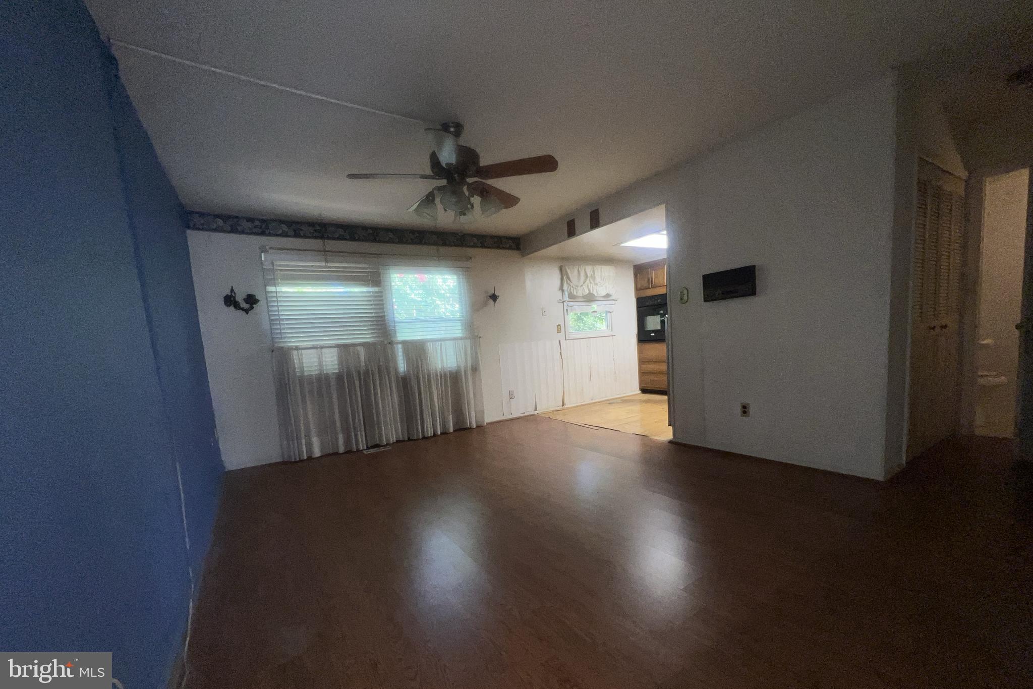 1723 Gabriel Court Crofton, MD 21114 - Photo 12 of 46 a view of a livingroom with wooden floor and window