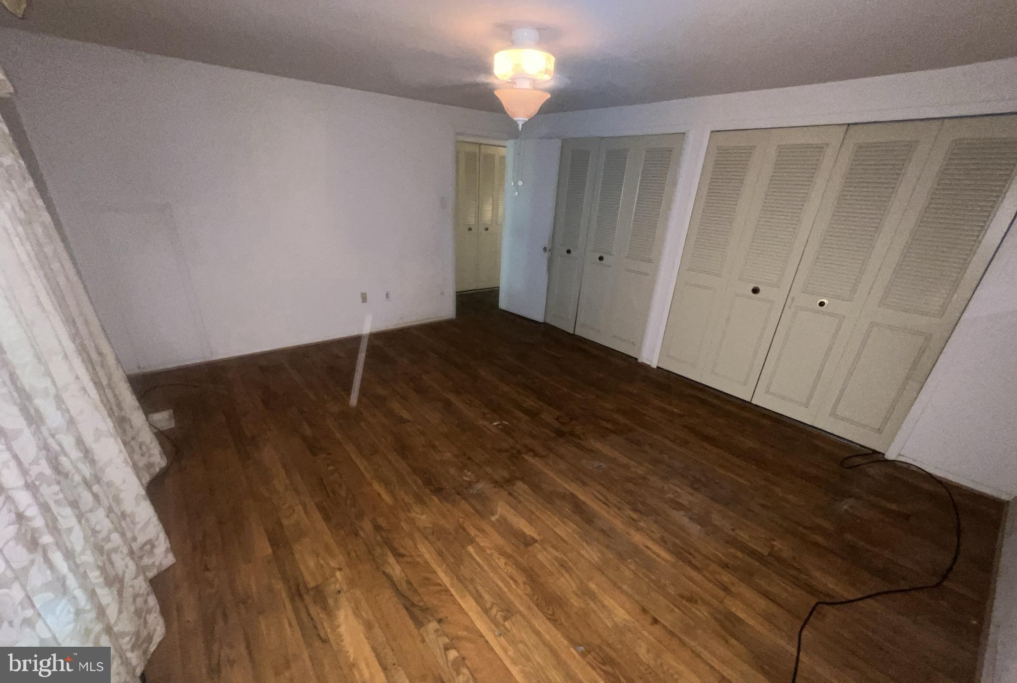 1723 Gabriel Court Crofton, MD 21114 - Photo 19 of 46 a view of empty room with wooden floor
